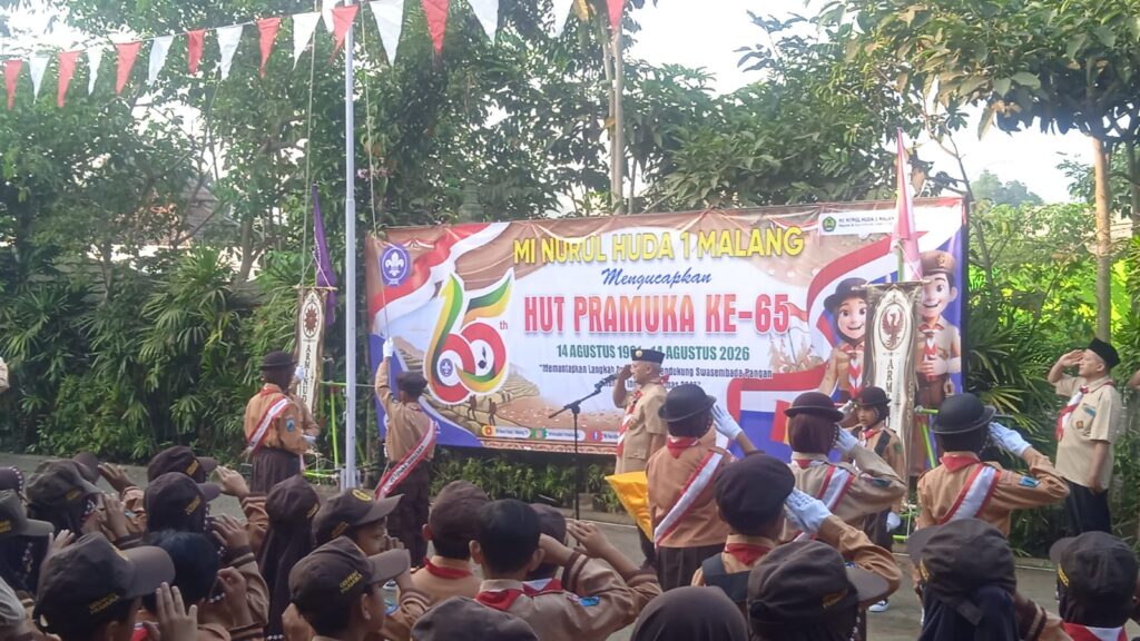 Meneguhkan Semangat Pramuka, Memantapkan Langkah Menuju Indonesia Emas 2045  Peringatan Hari Pramuka ke-65 Tahun 2026 di MI Nurul Huda 1 Malang